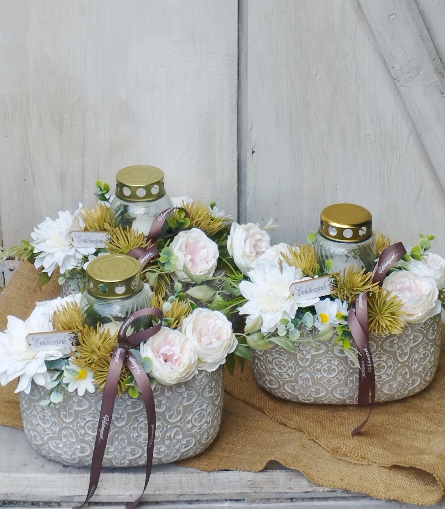 Kő kaspó mécsessel