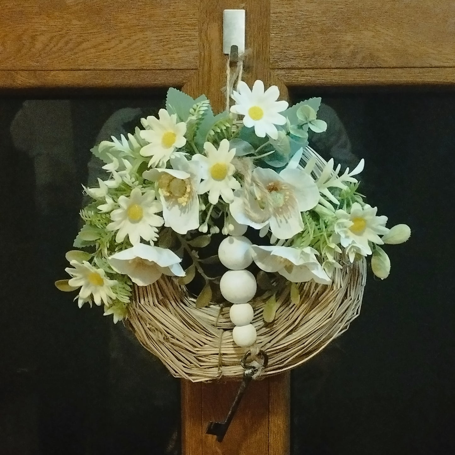 Fehér koszorú kulccsal